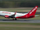 In this April 20, 2010 file photo, an Air Berlin jet takes off at Tegel airport in Berlin, Germany. In this April 20, 2010 file photo, an Air Berlin jet takes off at Tegel airport in Berlin, Germany.